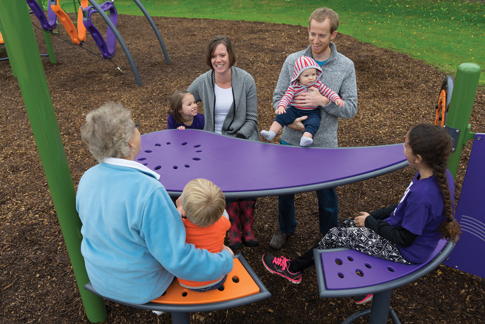 Family using park amenities